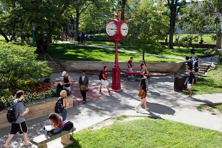 Students walking across campus.